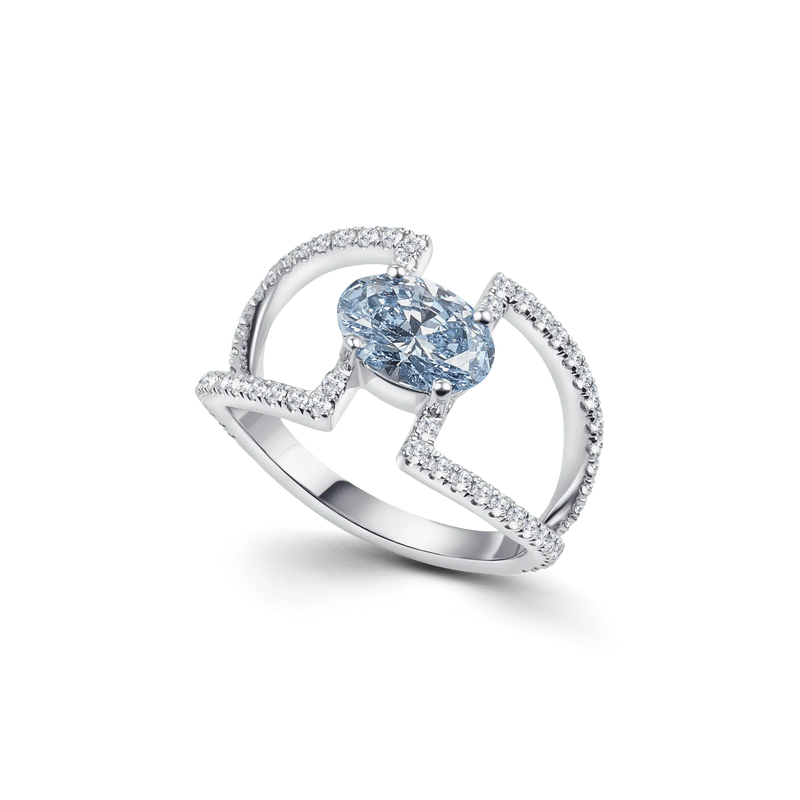 Product image of the Entre-Blue ring in white gold, featuring a 1.2ct blue oval diamond and a modern open double-band design.