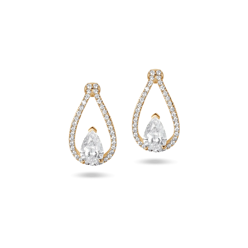 Floating Pairs earrings in yellow gold, featuring 0.80 ct pear-cut lab-grown diamonds with a diamond-studded halo.