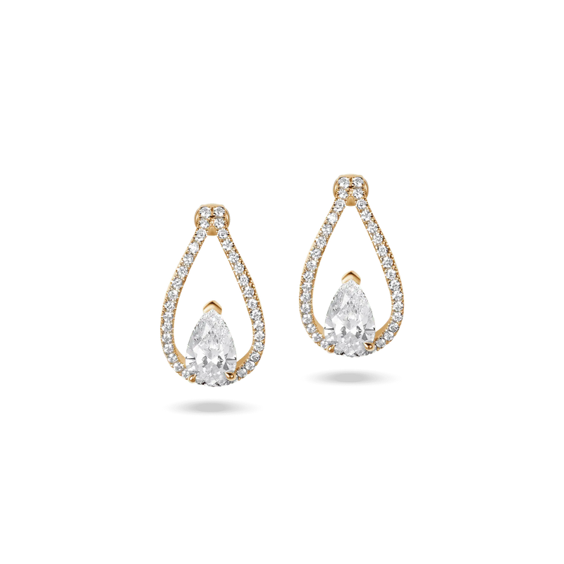 Floating Pairs earrings in yellow gold, featuring 0.80 ct pear-cut lab-grown diamonds with a diamond-studded halo.