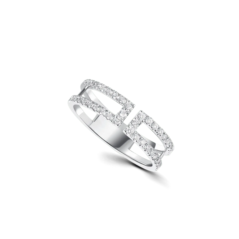 Loulou Petit in white gold, a delicate double-band ring with a geometric design and castle-set diamonds.