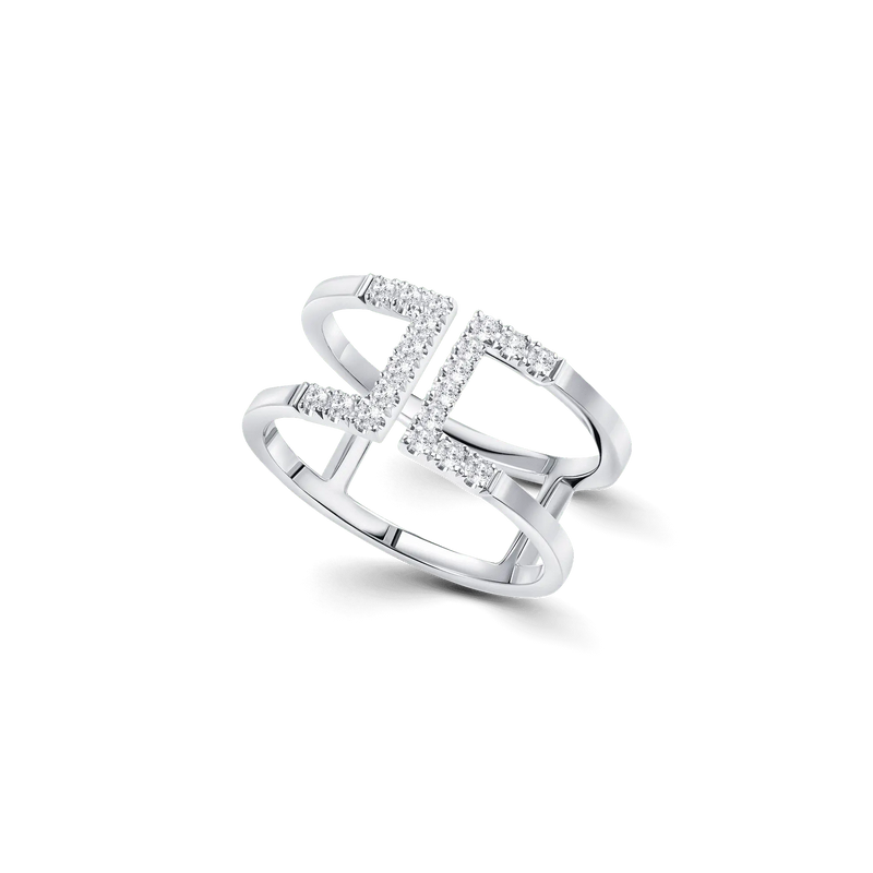 Loulou Icon in white gold, a double-band ring with an open design and castle-set diamonds.