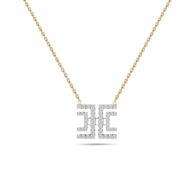 Harper necklace featuring a diamond-set geometric pendant on a yellow gold chain.