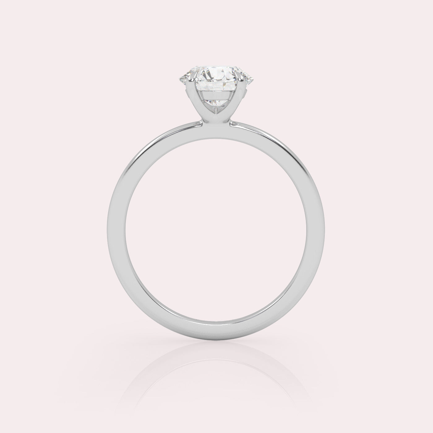 White Gold solitaire ring with a round-cut diamond, sideway view.