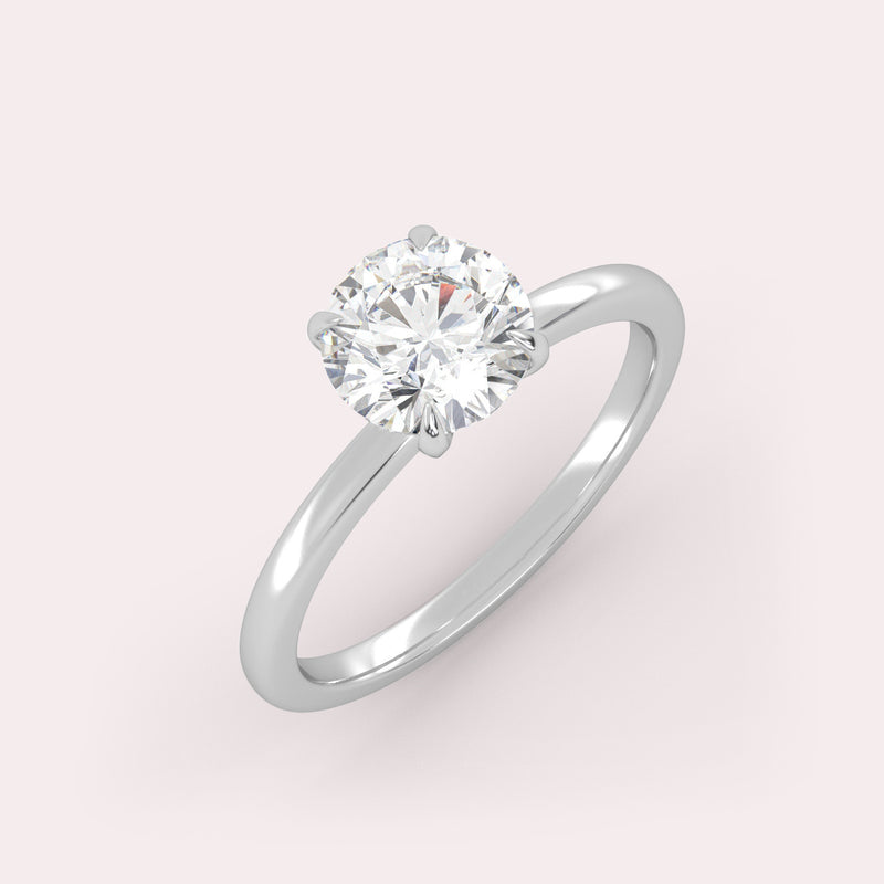 White Gold solitaire ring with a round-cut diamond